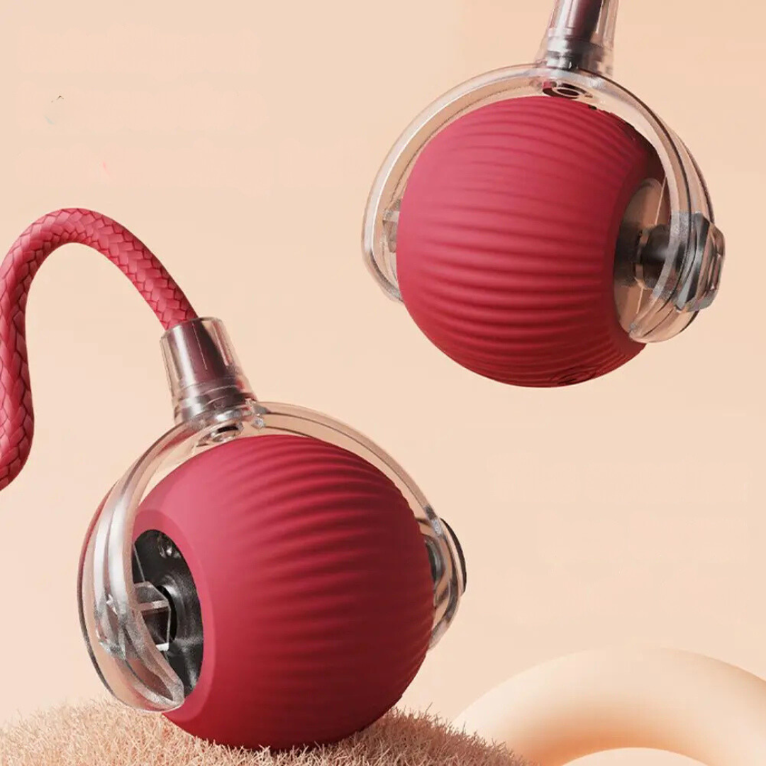 "Interactive cat toy, rolling ball with plush tail, vibrant color options for engaging feline play and exercise."