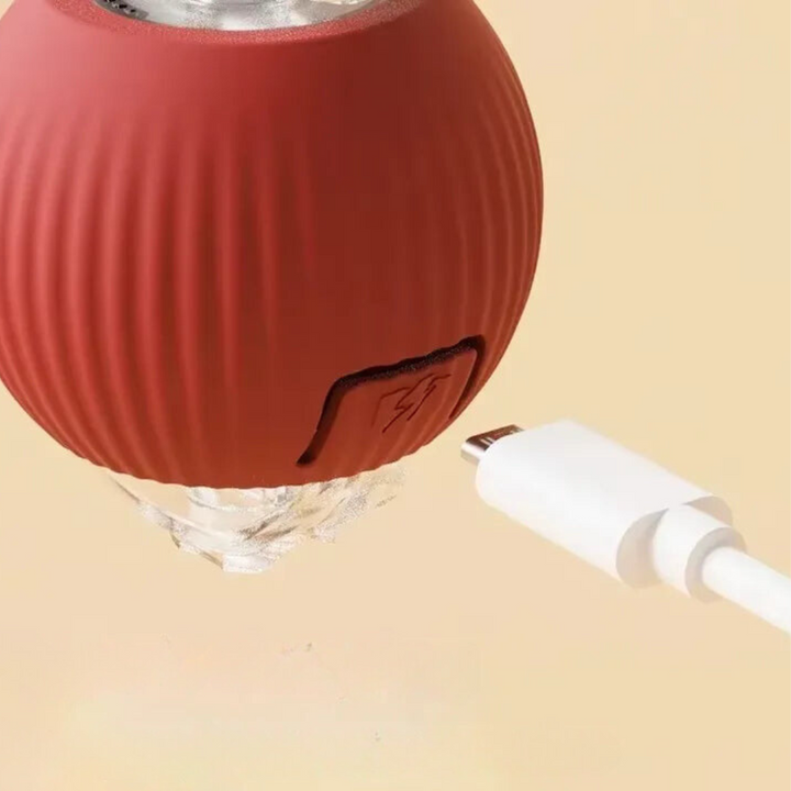 "Interactive cat toy, rolling ball with plush tail, vibrant color options for engaging feline play and exercise."
