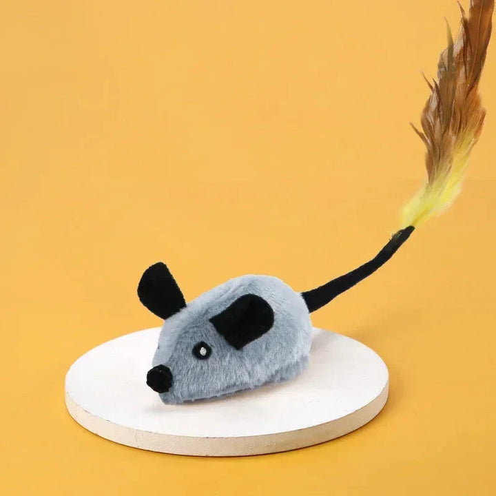 Interactive cat toy with plush mouse and feather tuft, designed for engaging play and sparking your cat's hunting instincts.