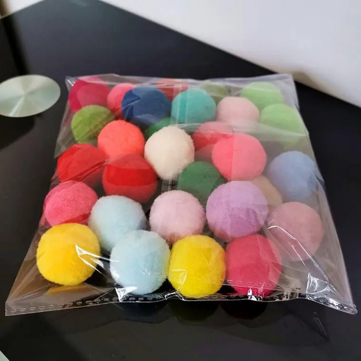 Interactive multi-layer cat toy ball with colorful rolling balls, designed for engaging play and promoting feline fitness.