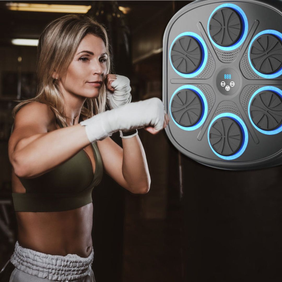 "Interactive music boxing machine for fitness, featuring colorful sensors, sleek design, suitable for adults and kids."