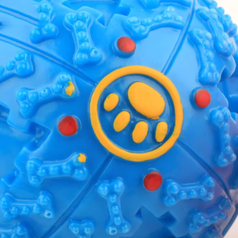 "Interactive squeaky ball with treat function for dogs, shown in various vibrant colors and sizes, durable pet toy."