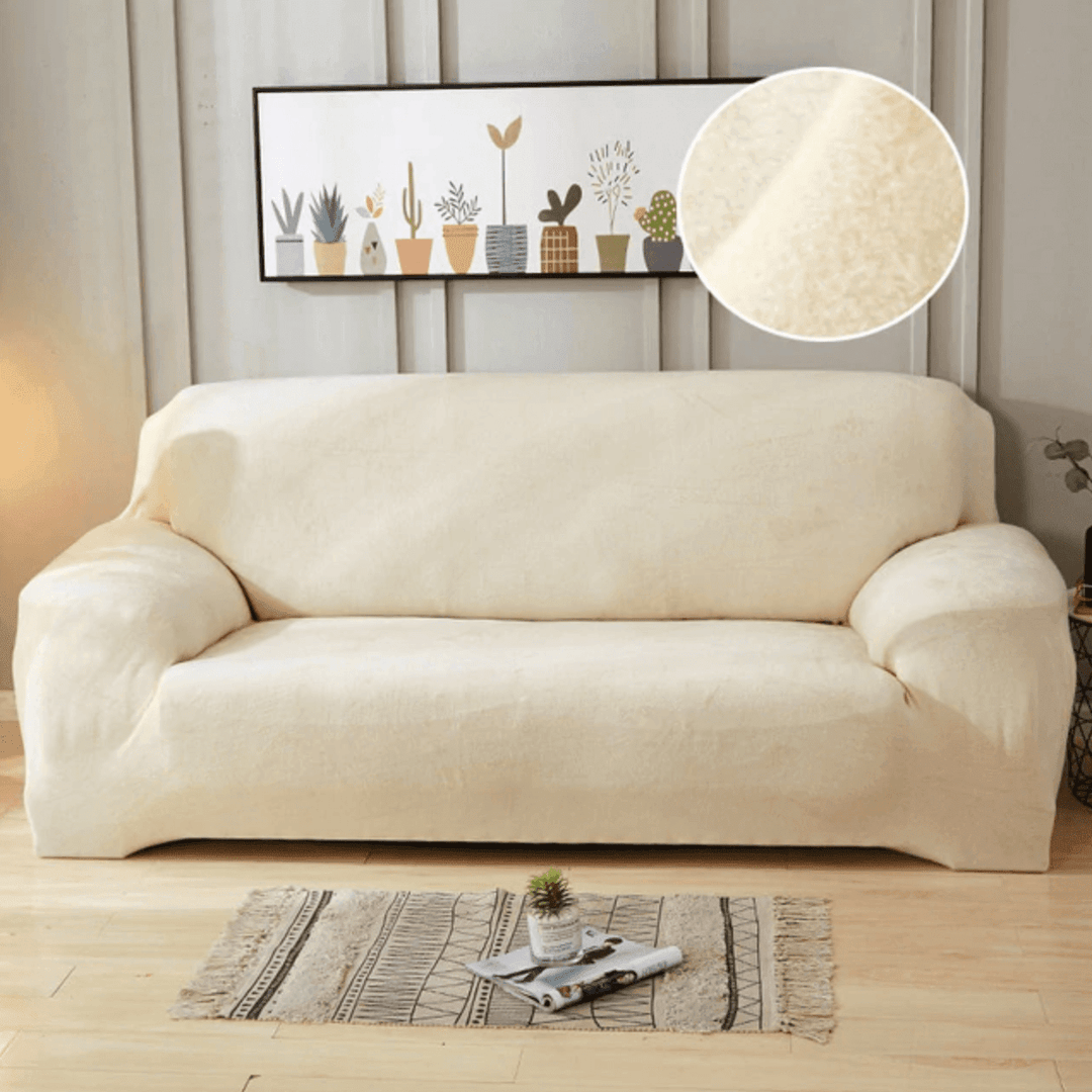 Ivory Plush Sofa Cover showing versatile fit on an L-shaped sofa, enhancing style with soft, luxurious material.