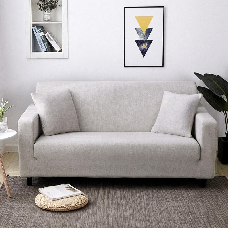 Ivory sofa stretch cover fits all styles, offering a snug, clean look with protection for sectionals, loveseats, and more.