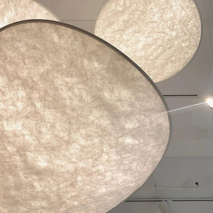 Japandi style silk pendant light with minimalist design, soft glow, and elegant finish; ideal for modern interiors.