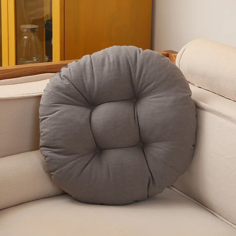 "Japanese Futon Floor Cushion with thick PU foam in chic grey, ideal for meditation or relaxing, shown on wood floor."