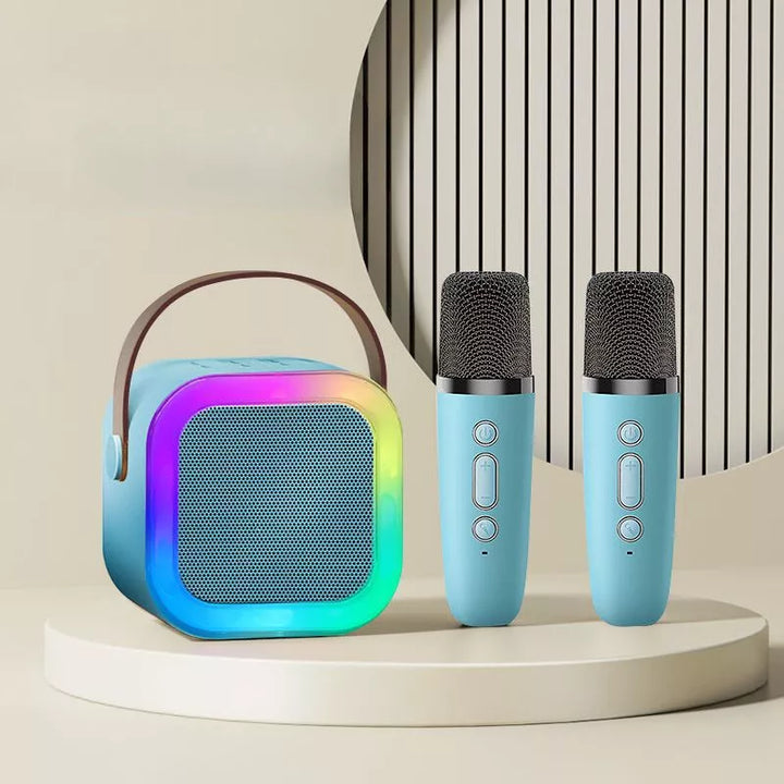 "Kids portable mini karaoke machine with wireless mics, LED lights, vibrant colors, fun for ages 3-12."
