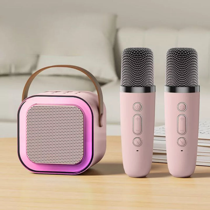 "Kids portable mini karaoke machine with wireless mics, LED lights, vibrant colors, fun for ages 3-12."