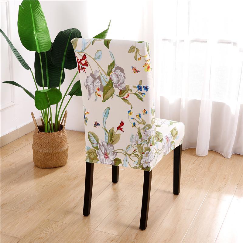 Luxurious elastic chair cover with stylish floral pattern, adds elegance and protection, fits various sizes, enhances comfort