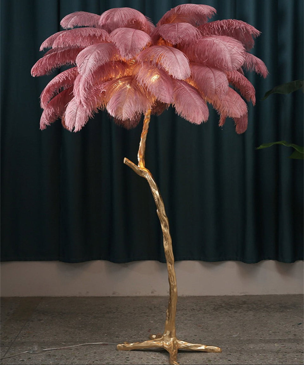 Luxurious Ostrich Feather Floor Lamp with cascading feathers, polished brass finish, and resin base for elegant home lighting