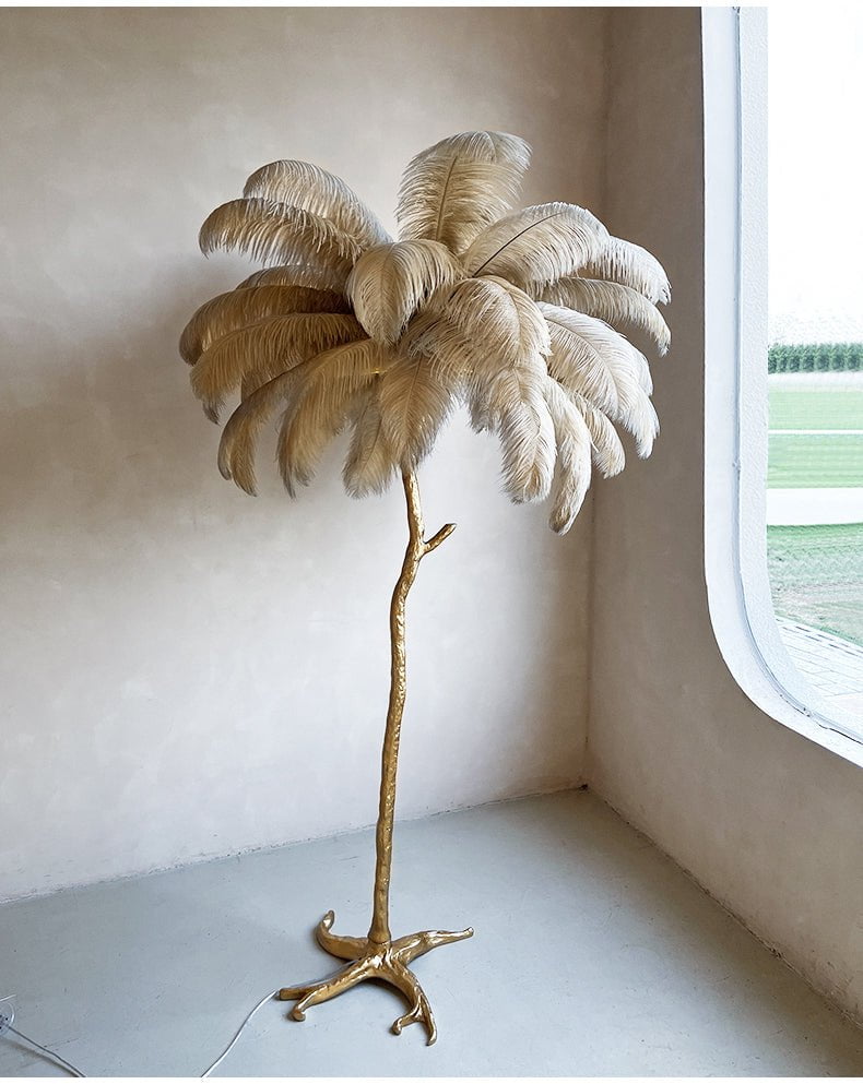 Luxurious Ostrich Feather Floor Lamp with cascading feathers, polished brass finish, and resin base for elegant home lighting