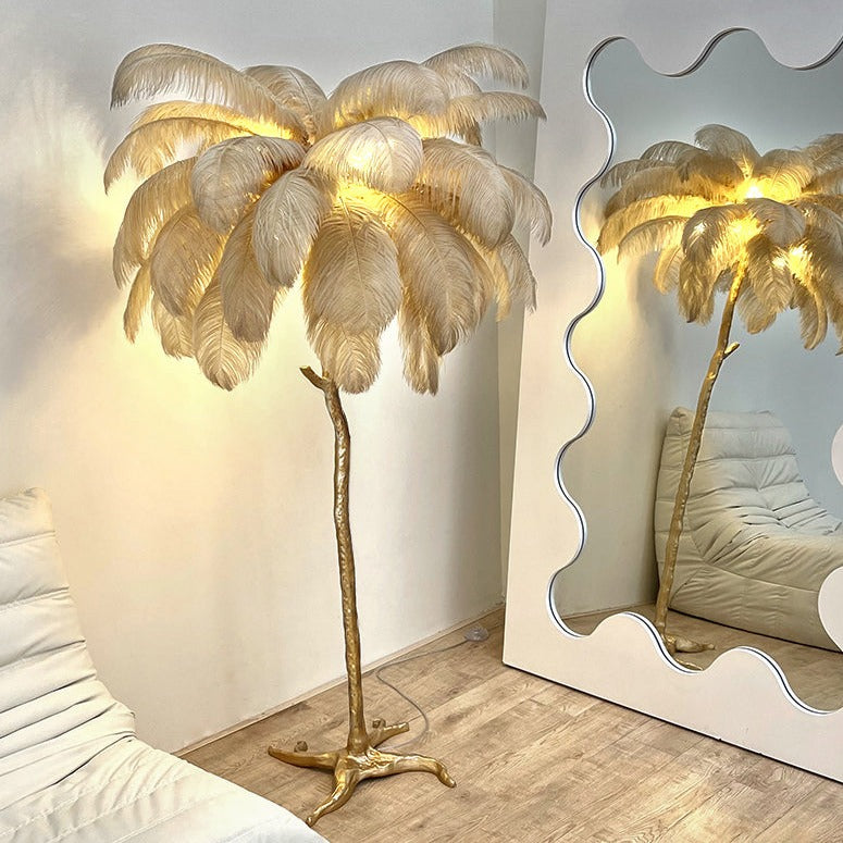 Luxurious Ostrich Feather Floor Lamp with cascading feathers, polished brass finish, and resin base for elegant home lighting