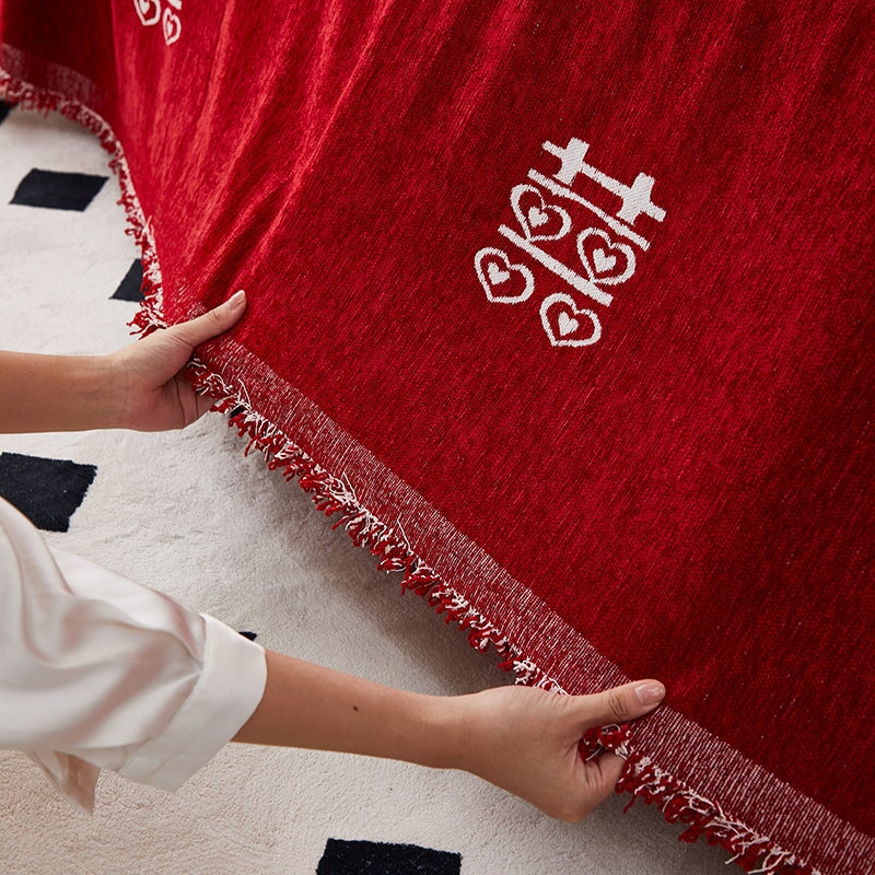 "Luxurious Rosy Sofa Throw Cover; stretchable, durable fabric; protects sofa; elegant design; seamless fit."