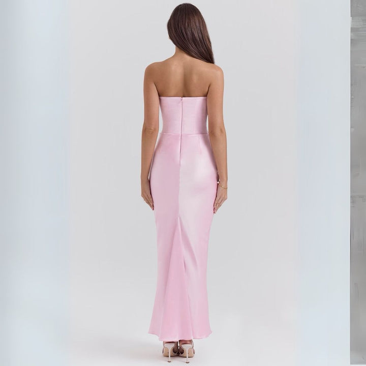 Luxurious satin strapless corset maxi dress, features dramatic draped hip detail, elegant silhouette, perfect for occasions.