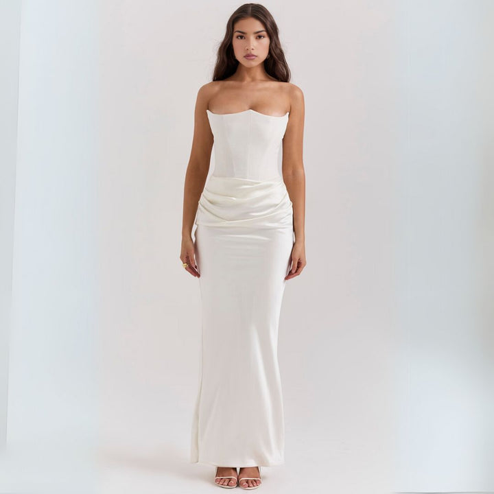 Luxurious satin strapless corset maxi dress, features dramatic draped hip detail, elegant silhouette, perfect for occasions.