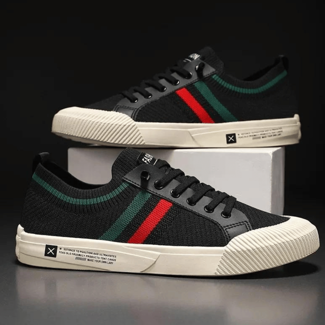 "Men’s casual sneakers in breathable knit fabric, lace-up design with durable rubber sole, perfect for everyday comfort."