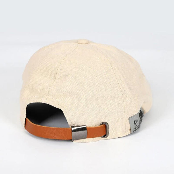 "Men's classic timeless cap with elegant design, suitable for formal and casual wear; a sophisticated accessory."