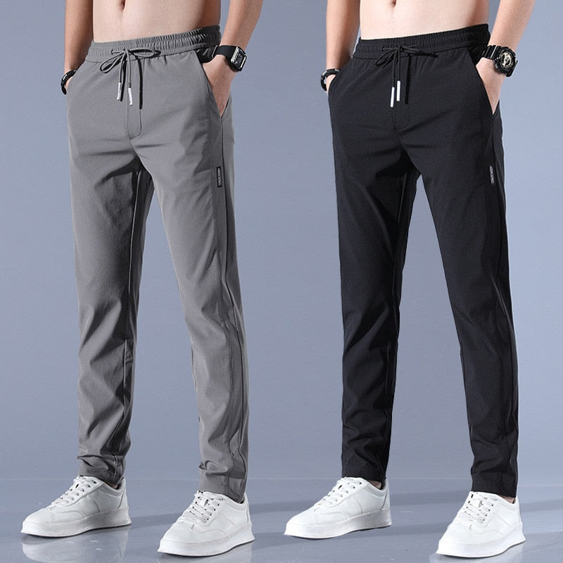 Men's cotton chino pants with a sleek, modern fit in versatile shades, perfect for formal or casual occasions.