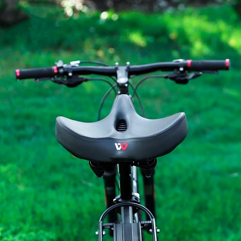 Men's extra wide breathable ergonomic bike saddle, black, padded, enhancing comfort and durability, sporting elegance.
