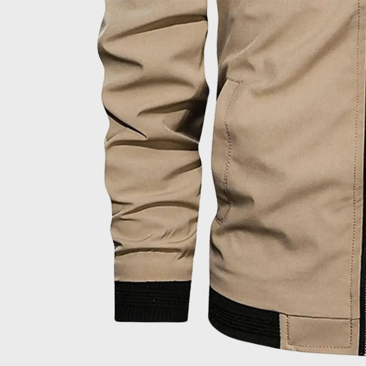 "Men's lightweight all-season bomber jacket with sleek design, zip closure, and multiple color options for versatile wear."