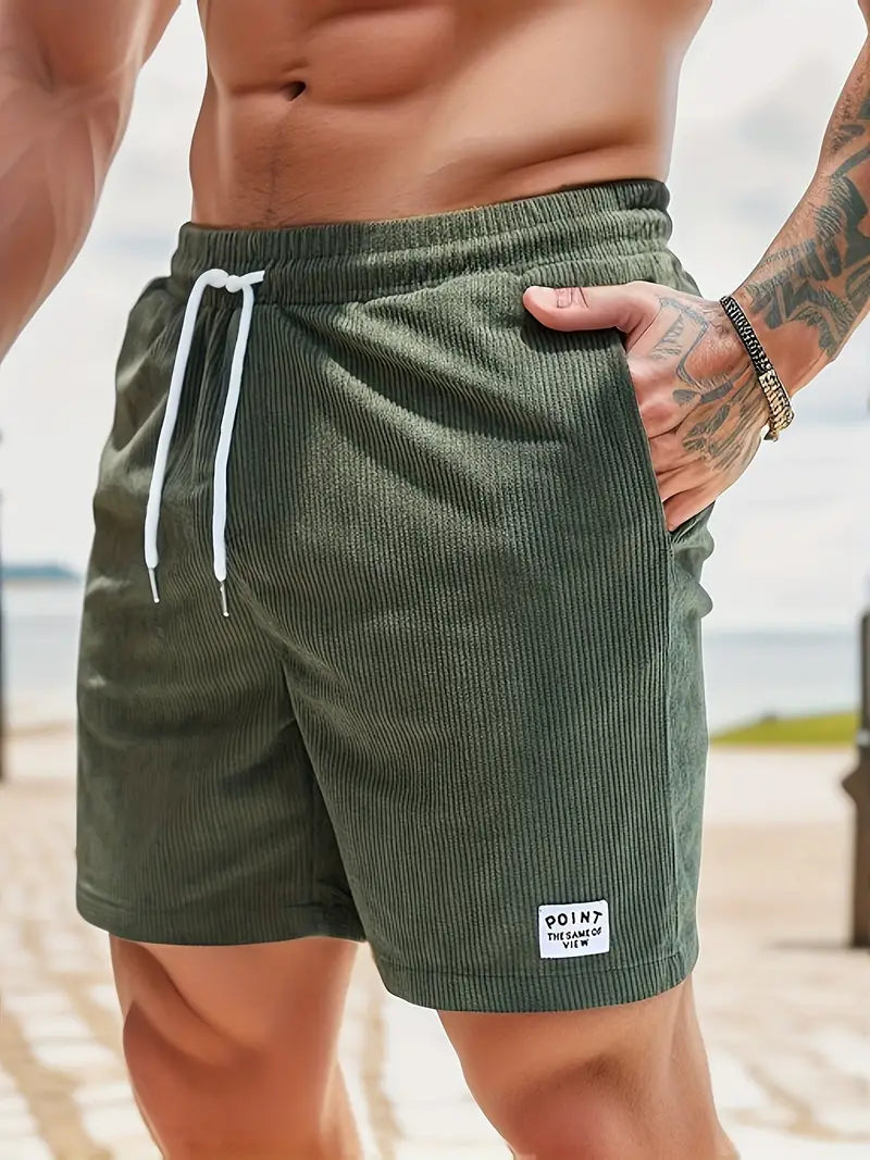 "Men's loose-fit corduroy shorts with drawstring waist in various colors, soft texture, relaxed fit for casual wear."
