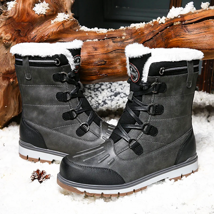 Men's mid-calf waterproof insulated snow boots with brown synthetic exterior and plush lining for winter warmth and protectio