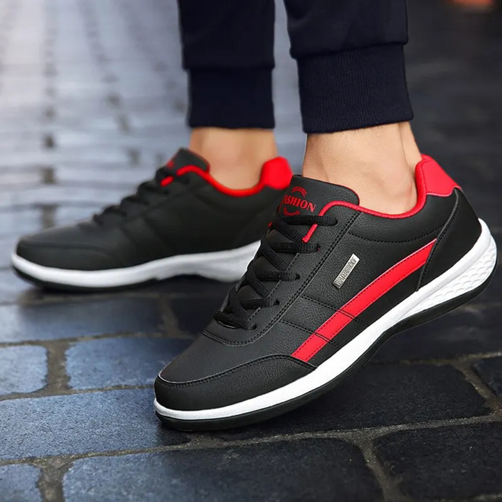 "Men's orthopedic leather sneakers in white, offering comfort, style, and orthopedic support, with breathable design."