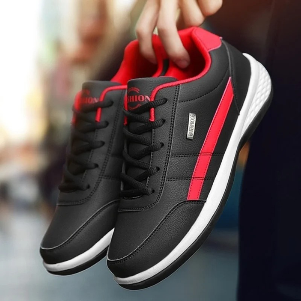"Men's orthopedic leather sneakers in white, offering comfort, style, and orthopedic support, with breathable design."