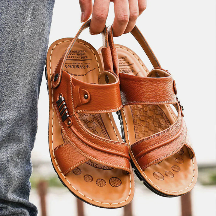 "Men's orthopedic sandals with slip-on design, durable sole, and breathable materials for all-season comfort and style."