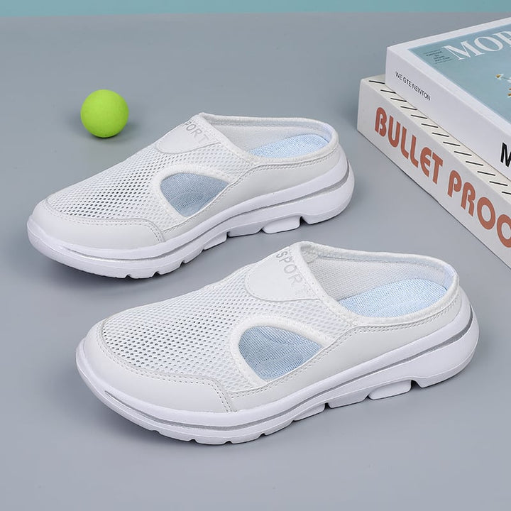 "Men's orthopedic slip-on slippers with ergonomic sole, sleek design, cushioned padding, for ultimate comfort and support."