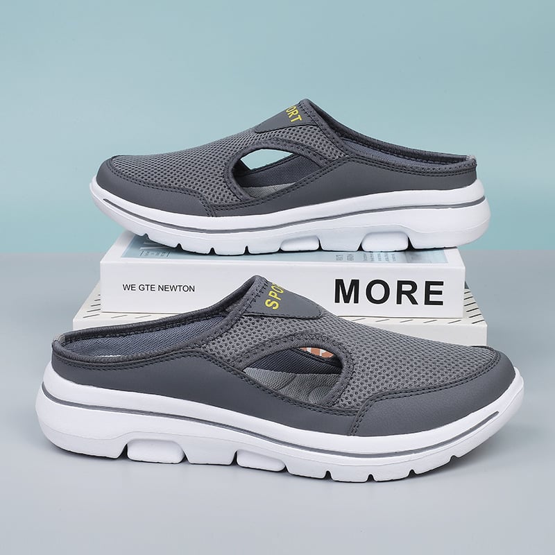 "Men's orthopedic slip-on slippers with ergonomic sole, sleek design, cushioned padding, for ultimate comfort and support."