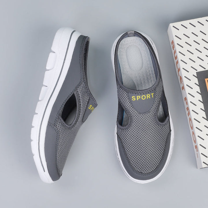 "Men's orthopedic slip-on slippers with ergonomic sole, sleek design, cushioned padding, for ultimate comfort and support."