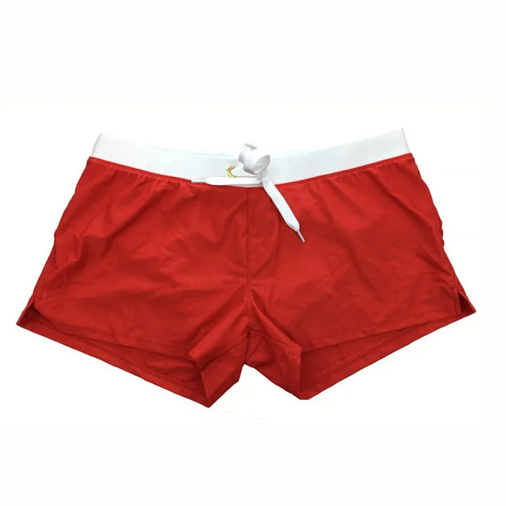 "Men's quick-dry swim shorts with adjustable waistband, sleek design, side slits, and drawstring closure for swim comfort."