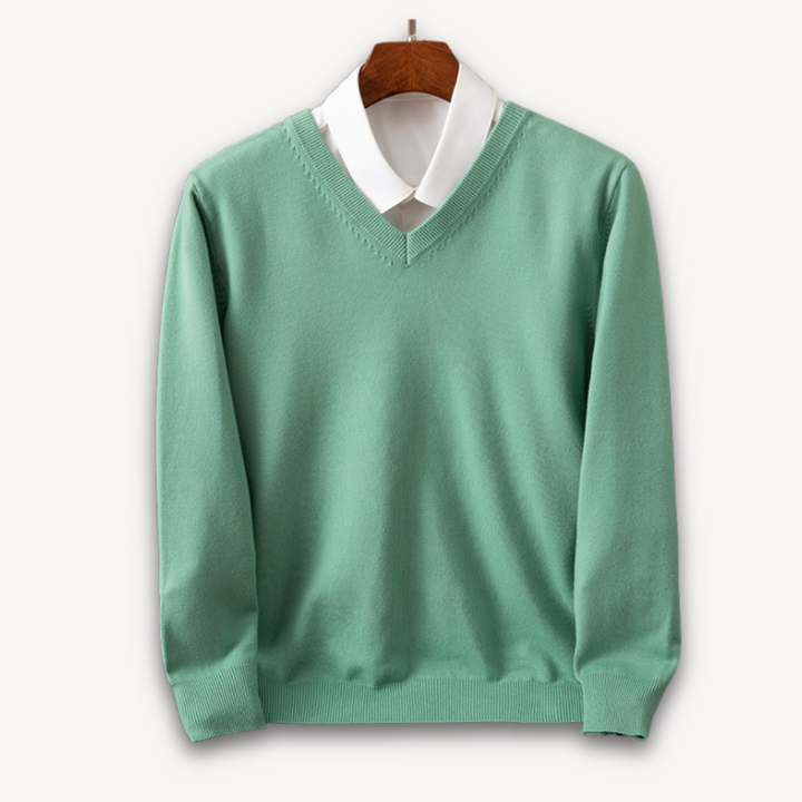 "Men's slim fit cashmere V-neck sweater in black, showcasing soft fabric and versatile design for casual or formal wear."
