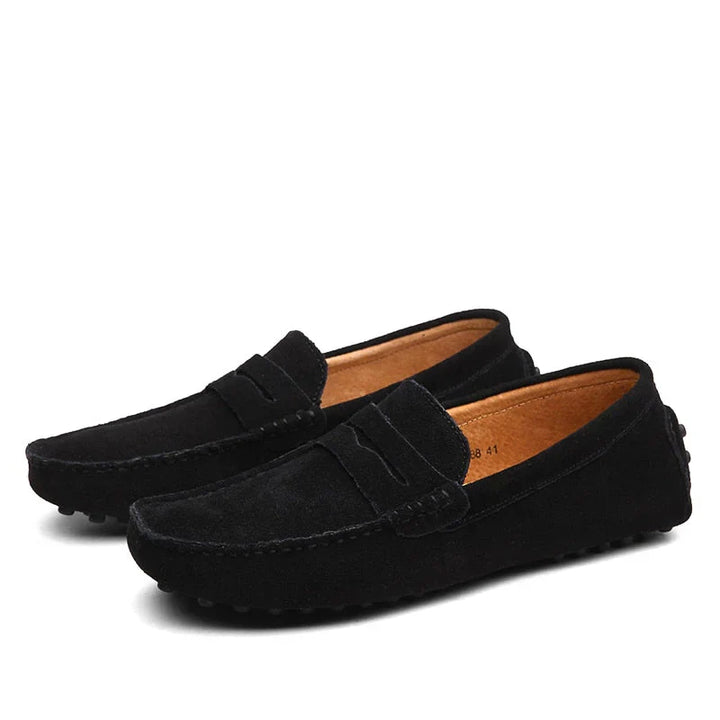 "Men's suede driving loafers with flexible sole, showcasing elegant design and non-slip rubber grip."