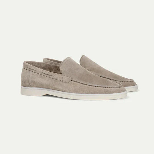 "Men's suede loafers in dark brown, elegant and comfortable, perfect for casual or formal wear, crafted from luxury suede."