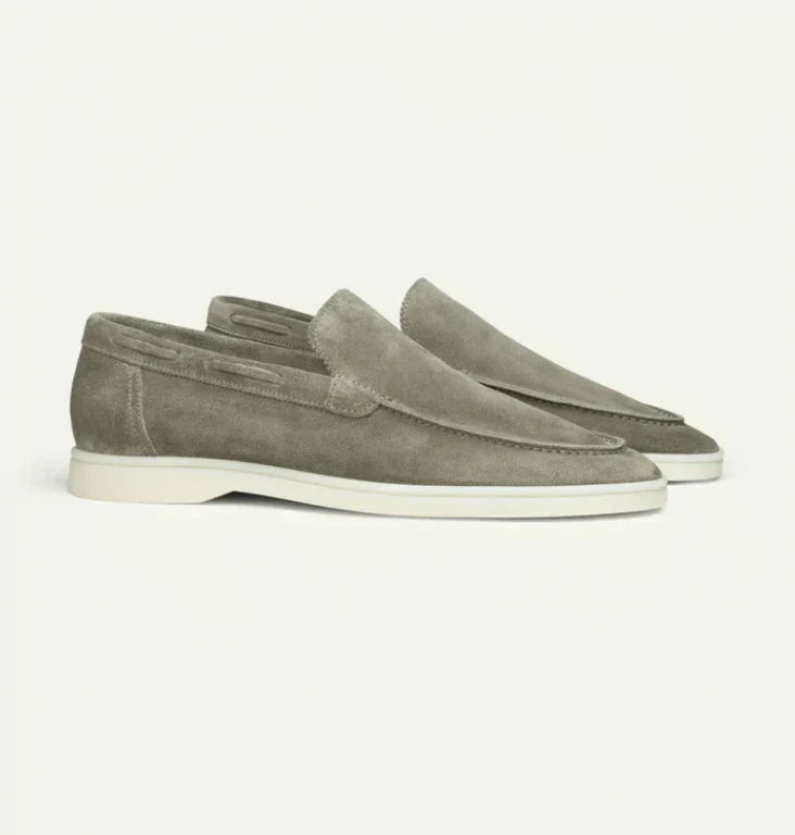 "Men's suede loafers in dark brown, elegant and comfortable, perfect for casual or formal wear, crafted from luxury suede."