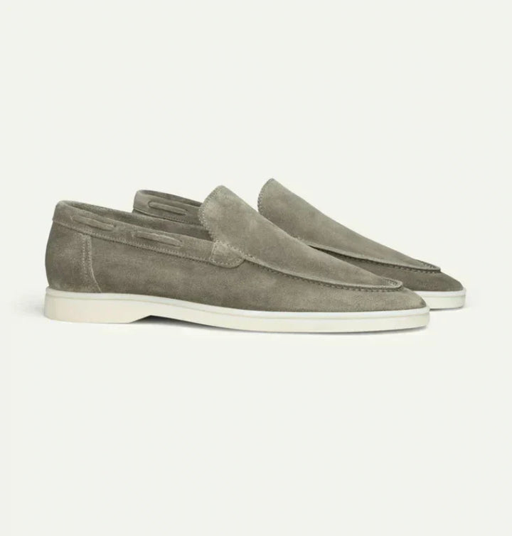 "Men's suede loafers in dark brown, elegant and comfortable, perfect for casual or formal wear, crafted from luxury suede."