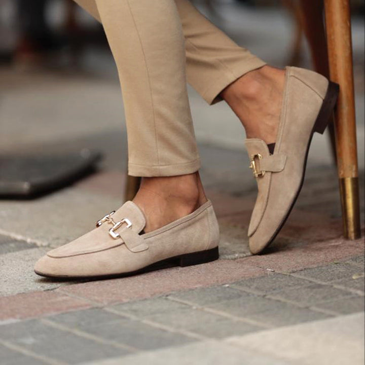 "Men's suede loafers with horsebit detail, featuring premium suede and classic almond toe design for stylish versatility."