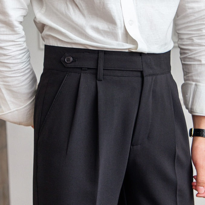 Men’s tailored essential trousers in classic colors, streamlined fit, perfect for formal or casual wear, showcasing elegance.