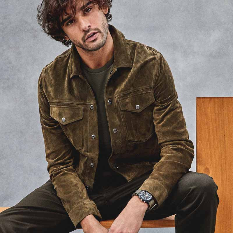 Men's vintage corduroy jacket with chest pockets, front view, showing button-up closure and textured fabric. Ideal for autumn
