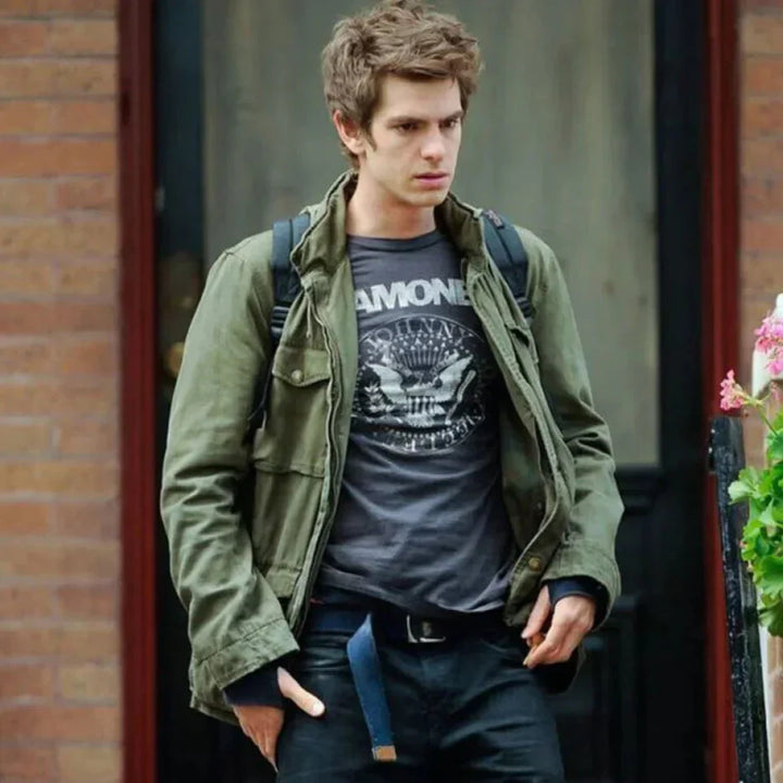 Men's vintage cotton field jacket with adjustable waist, rugged design, breathable fabric, suitable for layering.