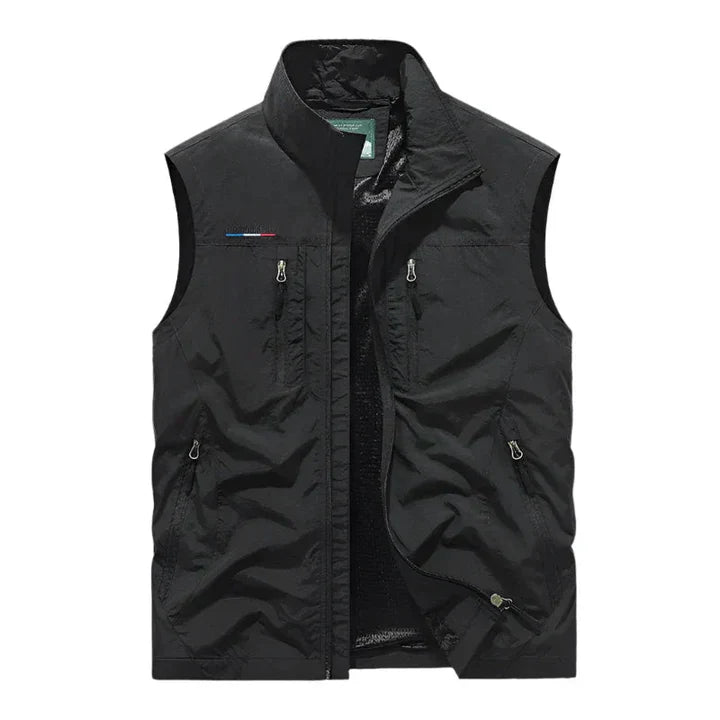 Men's waterproof insulated bodywarmer, sleek with multiple zip pockets; ideal for outdoor adventures in rain or chilly weathe