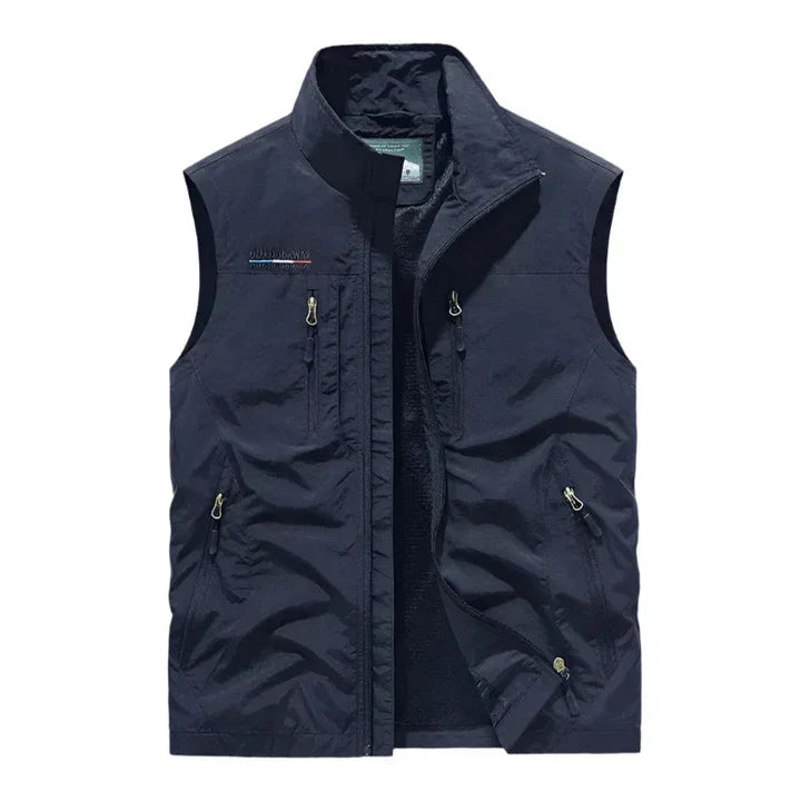 Men's waterproof insulated bodywarmer, sleek with multiple zip pockets; ideal for outdoor adventures in rain or chilly weathe