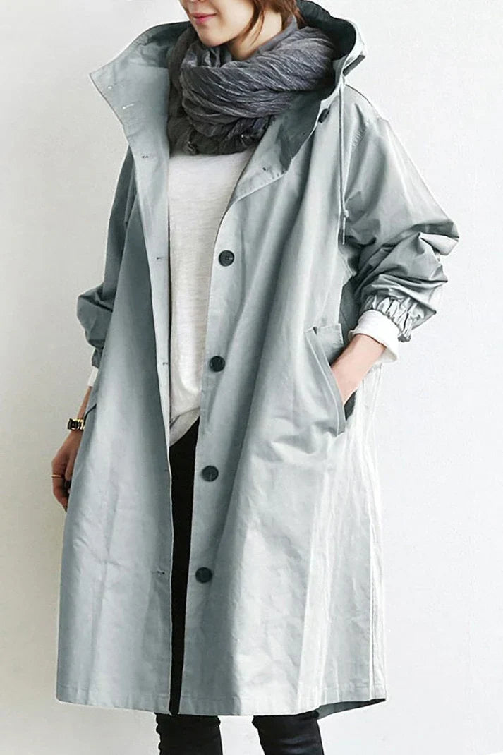 "Men's waterproof trench coat with hood, long tailored fit in black, showcasing stylish design and weather-resistant fabric."