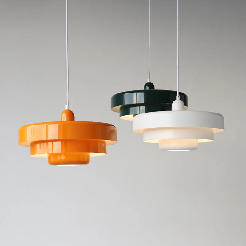 "Mid-century industrial pendant light, vibrant colors, sleek design; perfect for modern interiors, dining rooms, and offices.