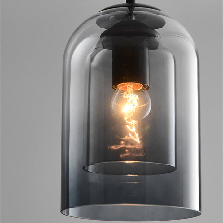 Mid-Century pendant lamp with double glass shades, polished iron fittings, smoke grey color, modern lighting for elegant spac