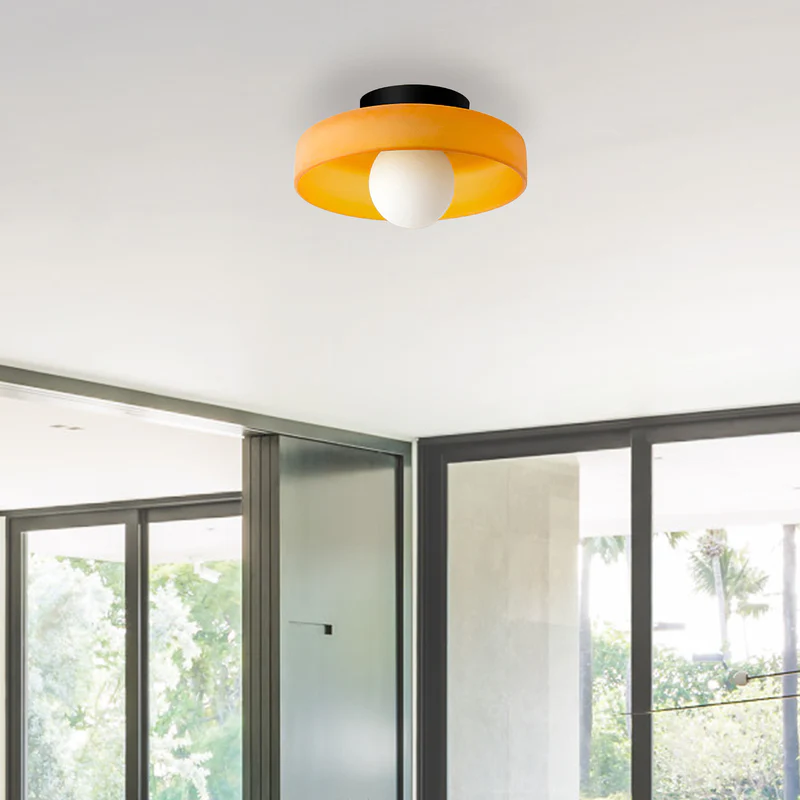 "Minimal flush mount ceiling light with frosted shade, sleek finish, offers soft illumination; ideal for modern and tradition