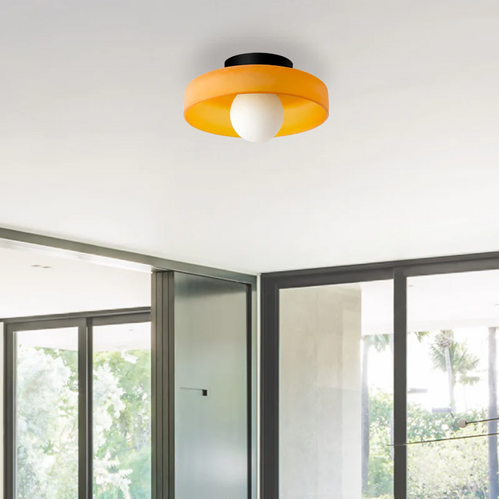 "Minimal flush mount ceiling light with frosted shade, sleek finish, offers soft illumination; ideal for modern and tradition