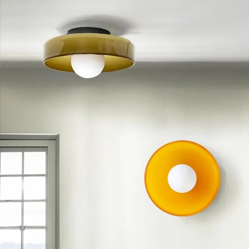 "Minimal flush mount ceiling light with frosted shade, sleek finish, offers soft illumination; ideal for modern and tradition